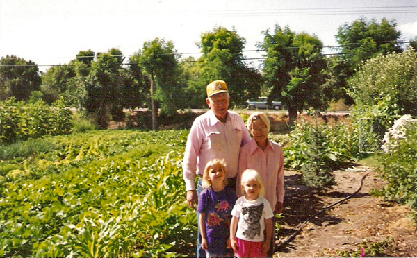 With my grandparents in their garden