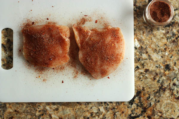 Seasoning the chicken